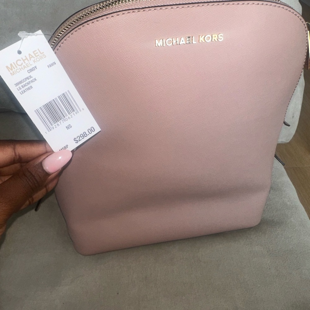 Authentic Brand New Michael Kors Blush/mauve limited edition backpack